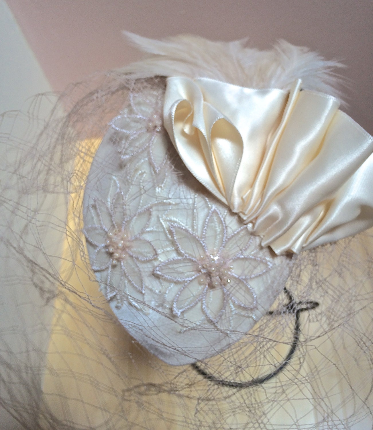 Perfect Wedding Fascinator, Ivory Bridal Headpiece with Unique Veiling, Satin ribbon Detail and Feather Pad- Beaded Vintage Appliqué-